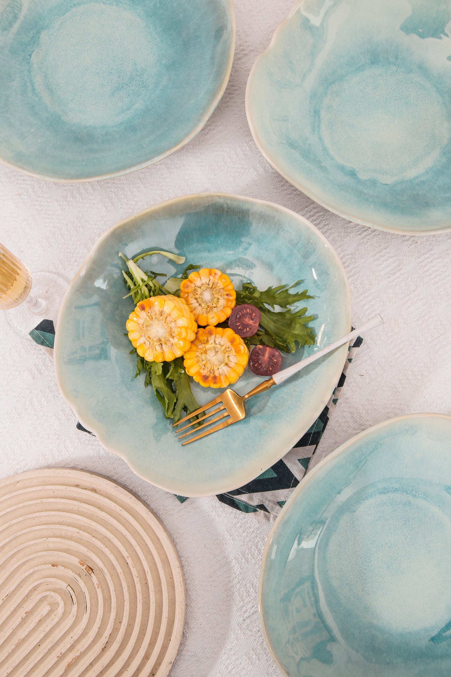 4-Piece Stoneware Deep Plate Set in Aqua Blue